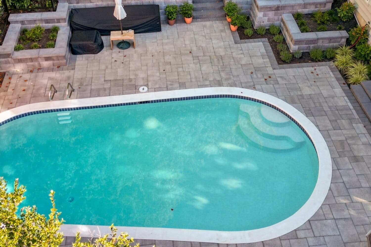 Moldy, Cracked, or Fading Pool Deck? Why Pavers Are the Smart Upgrade for Pool Decks