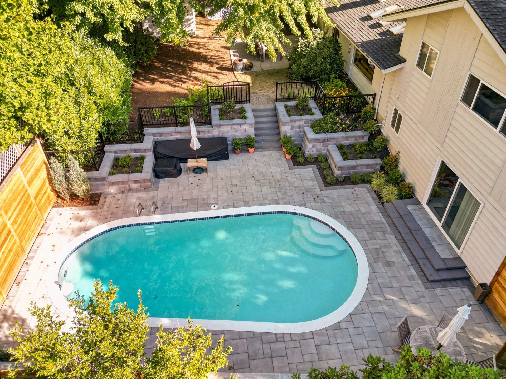Poolside Home Luxury: The Benefits of Adding Paver Decks with Your Renovation