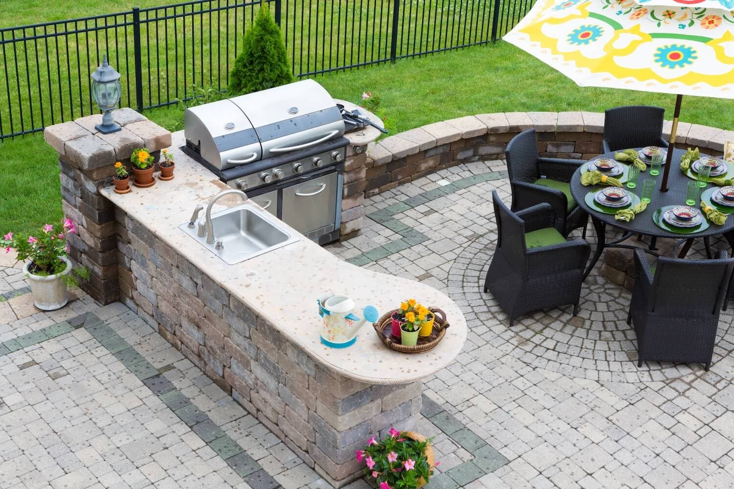 Custom Design: How an Outdoor Living Contractor Can Enhance Your Home's Landscape